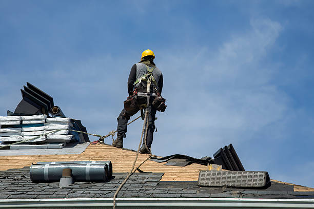 Professional Storm Damage Roof Repair technician working in Williamsburg, PA